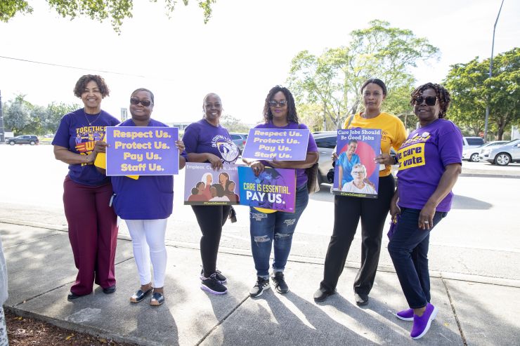 LTC West Broward press event 12-5-23 group photo, signs.jpg